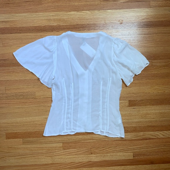 Mango Buttoned flowy blouse - Picture 7 of 9